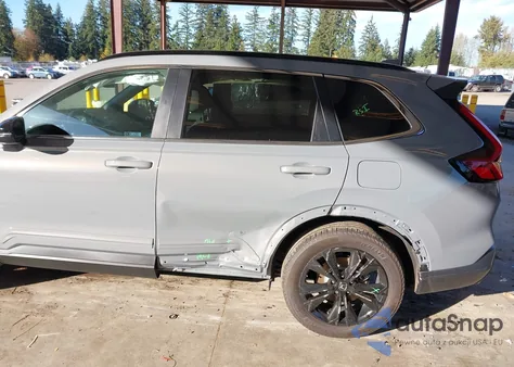 2025 Honda Cr-V Hybrid Sport Touring from USA, damaged, VIN 7FARS6H99SE074016